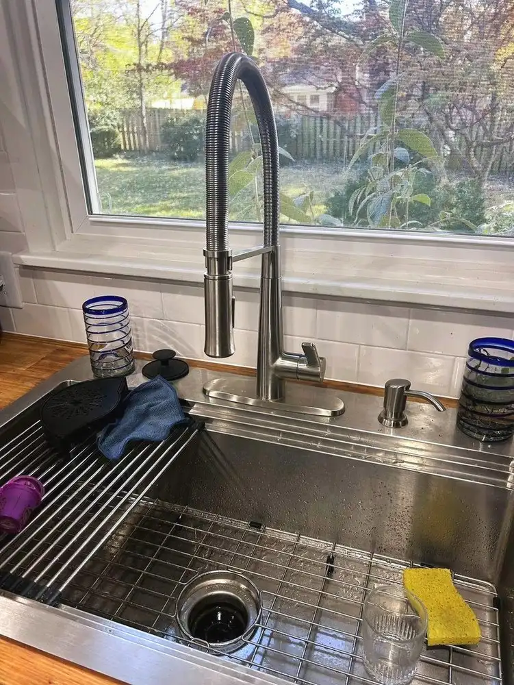 New stainless kitchen faucet installed