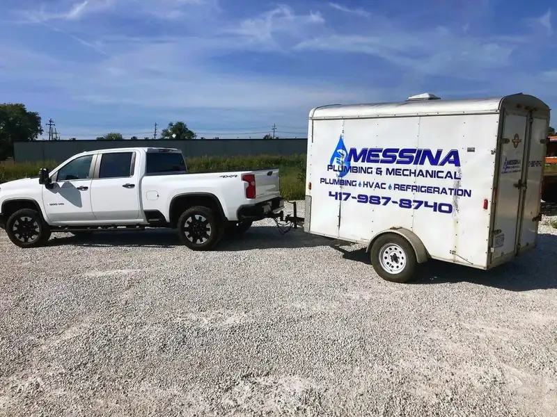 The Messina Plumbing truck and enclosed trailer