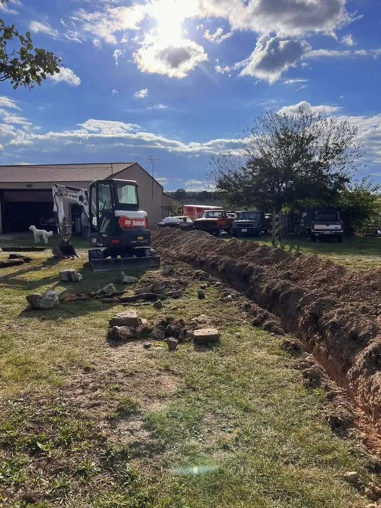 A trench run to a new build, with the mini excavator