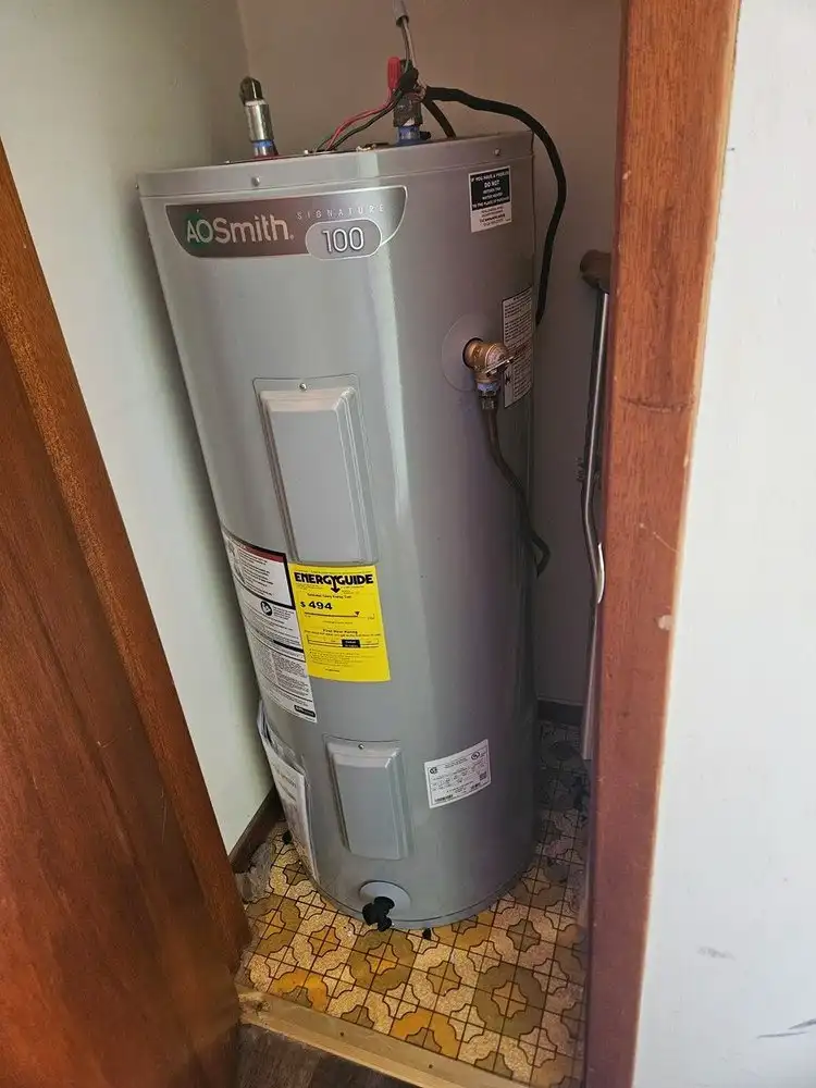 Water heater installed in a utility closet